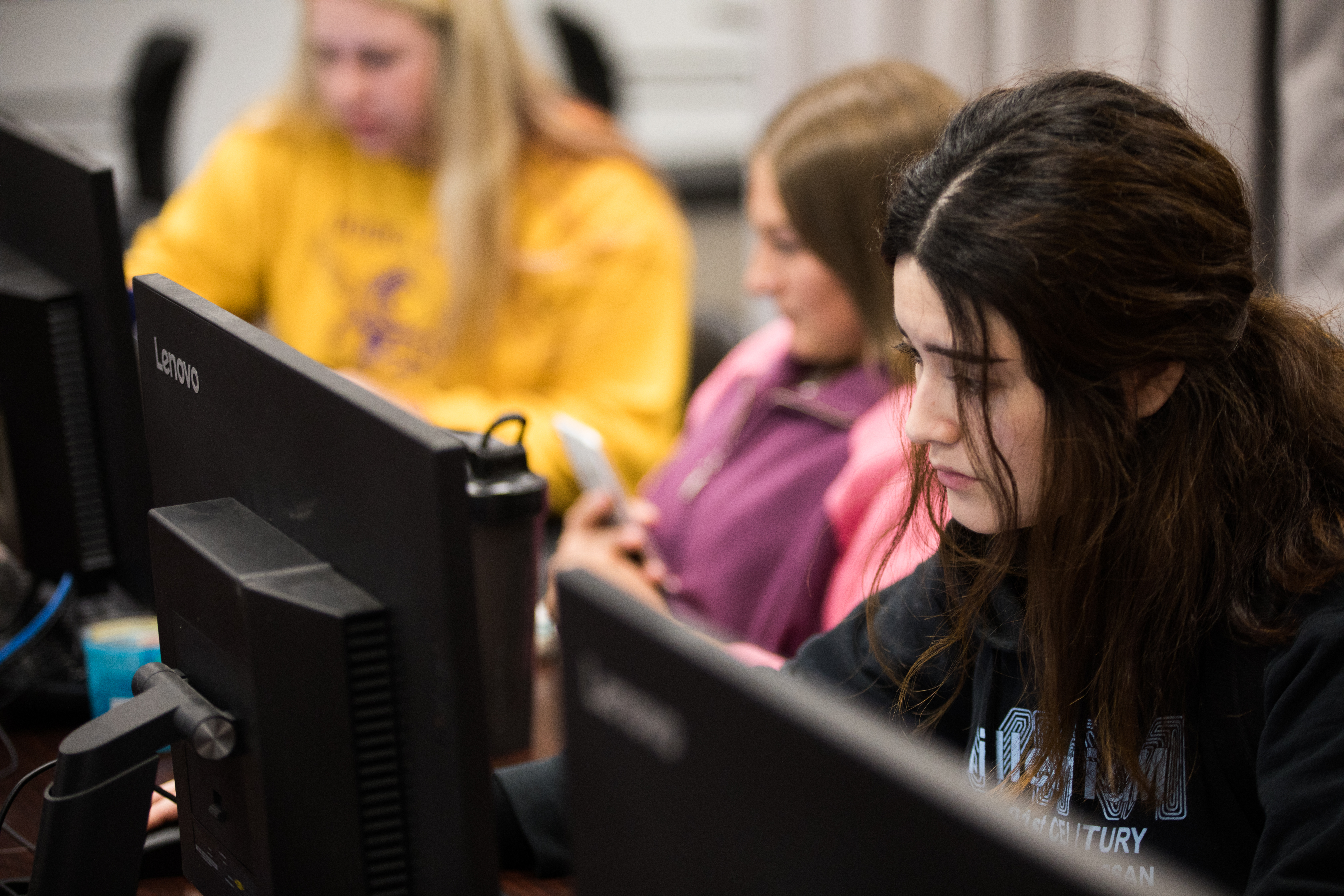 Students work in the computer lab during class