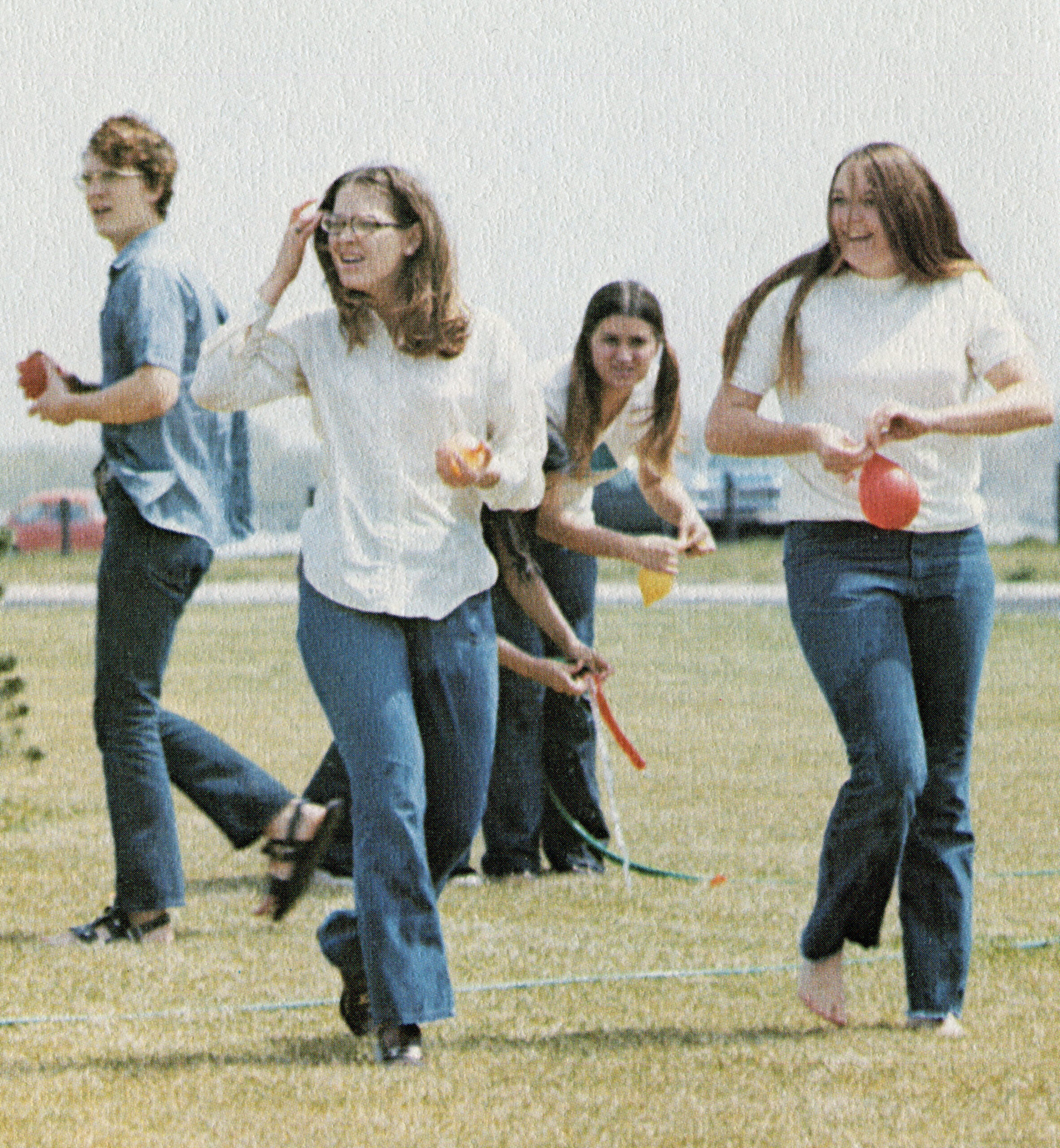 Students get ready for the water balloon fight in the grassy area between the north and south parking lots during the inaugural Spring Fling in 1972. [College Archives]
