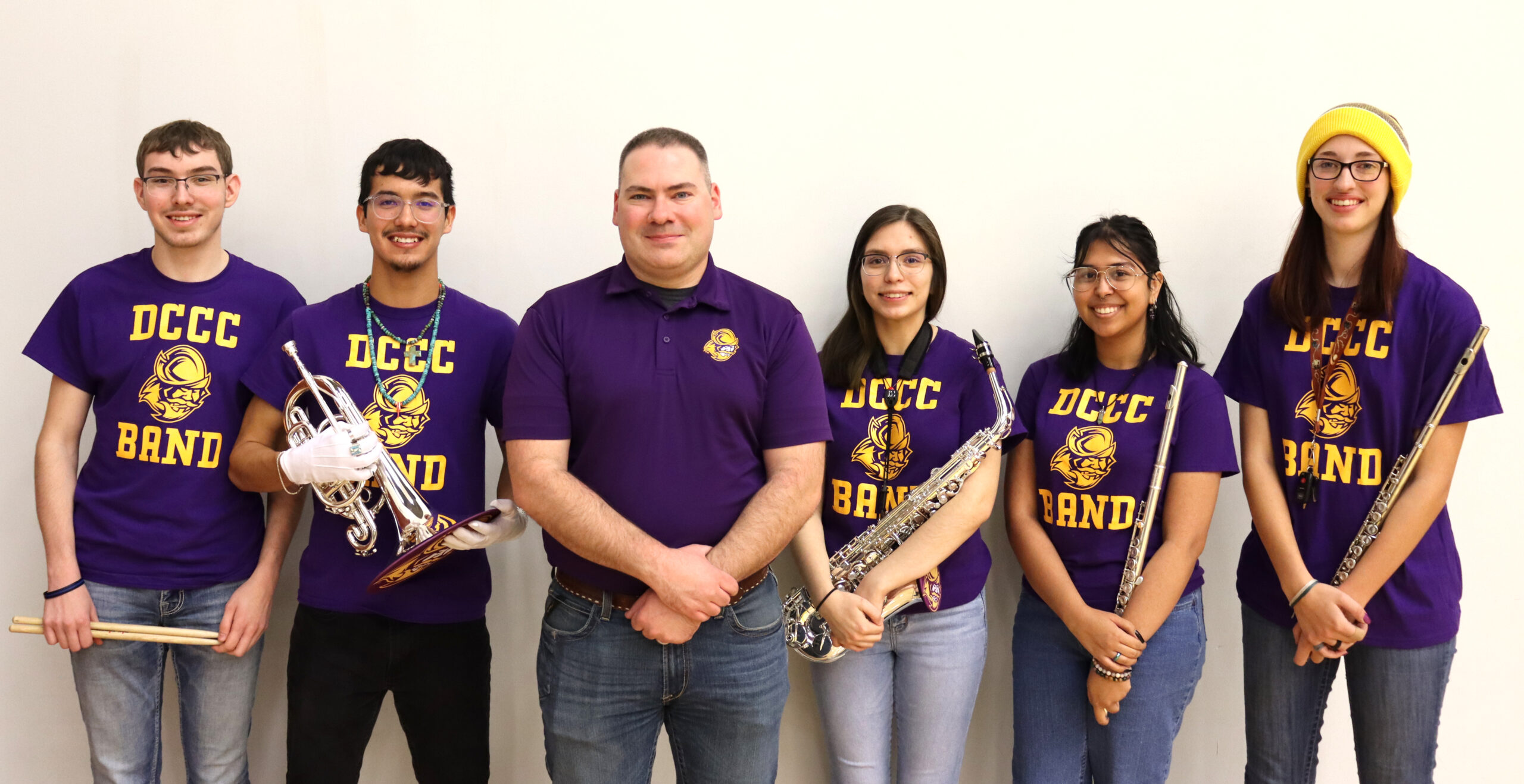 Six DC3 students have been selected for the KMEA In-Service Workshop honor band on Feb. 25, in Wichita, Kan. Pictured, from left to right, are Trevor Albert, a sophomore from Minneola, Kan.; Isaac Fuentes, a freshman from Rockdale, Texas; DC3 Band Director, Joel Vinson; Annia Llamas, a sophomore from Dodge City, Kan.; Esmeralda Gomez Garcia, a sophomore from Dodge City, Kan.; and Allison Haselhorst, a freshman from Dodge City, Kan. Not pictured is Parker Holuska, a sophomore from Dodge City, Kan. [Photo by Luke Fay]