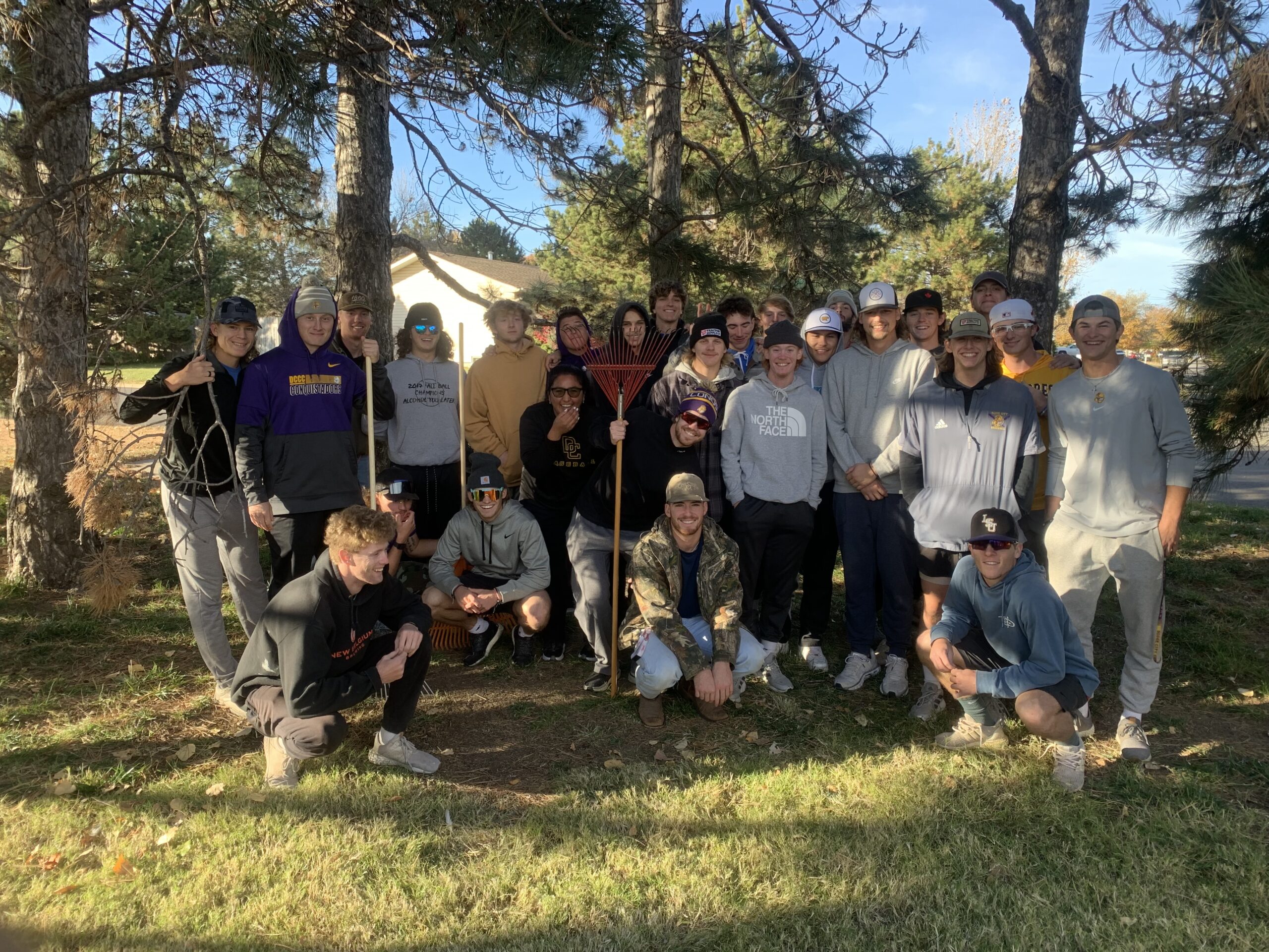 On Sunday, Nov. 14, members of the DC3 baseball team partnered with Ford County RSVP for the annual Fall Cleanup Day for Dodge City area senior citizens. [Photo by Annalynn Kirkhart]