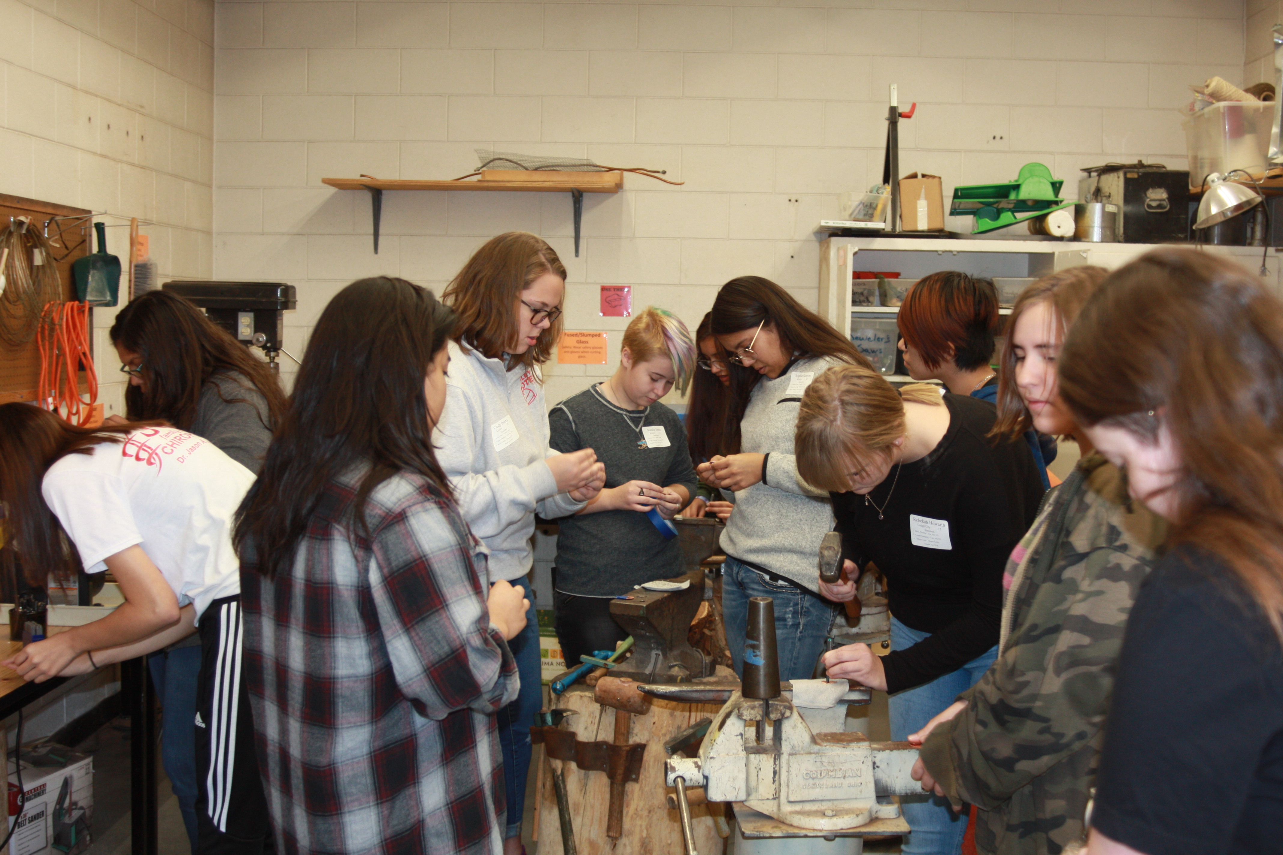 Students experiment with metal smithing during the 2018 DC3 Sampler Day