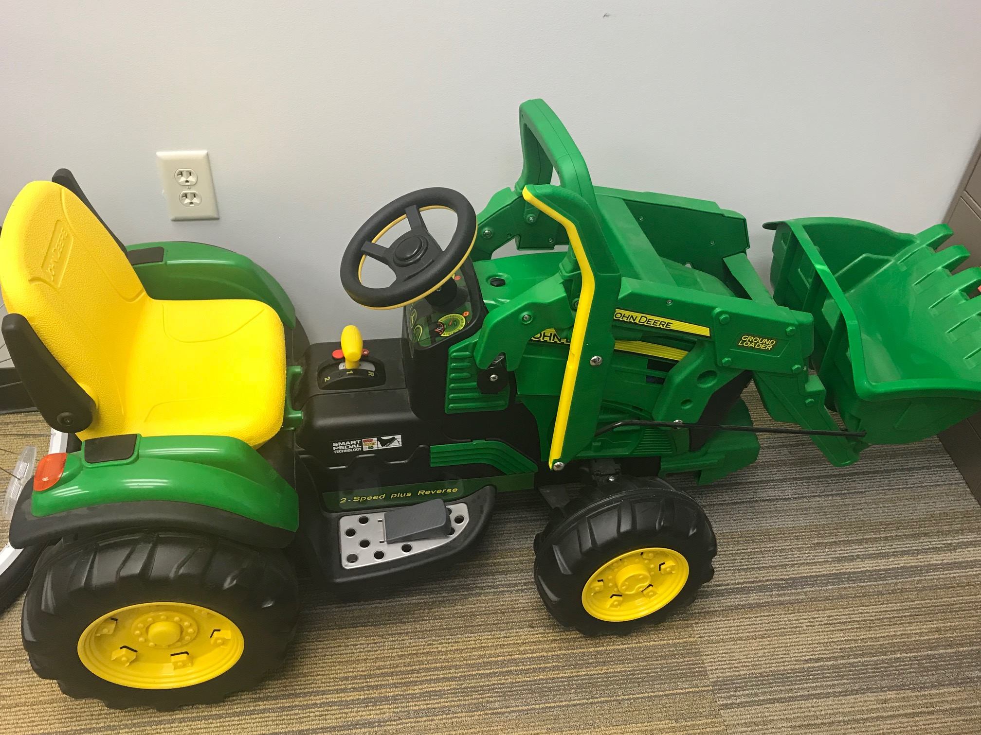 12-volt, ride-on tractor dontaed by American Implement